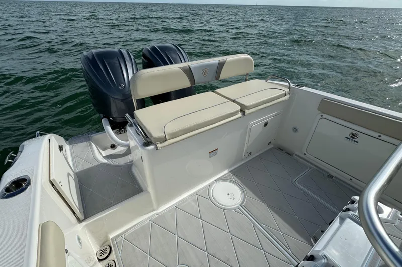Slide: The Image of Century 2600 CC 2015 boat with dual engines and seating, on open water. - 60