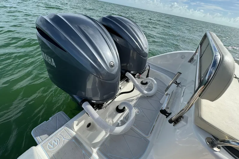 Slide: The Image of Century 2600 CC 2015 boat with dual Yamaha outboard motors on open water. - 66