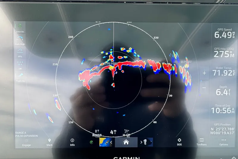 Slide: The Image of Garmin marine radar display on 2015 Century 2600 CC, showing GPS speed and water temperature. - 81