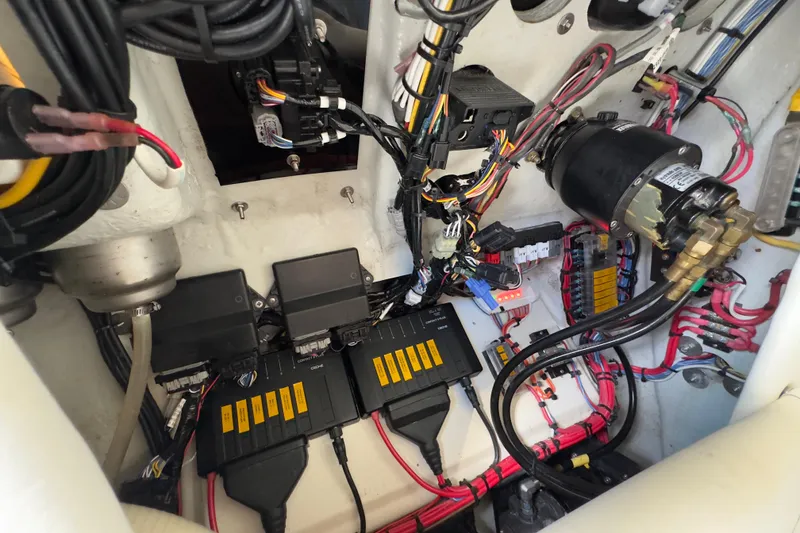 Slide: The Image of Electrical wiring and components inside a 2015 Century 2600 CC boat. - 87