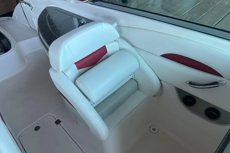 Slide: The Image of White and red seating on 2008 Chaparral 276 SSX boat interior. - 13