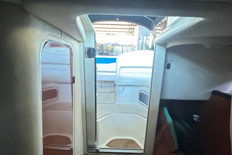 Slide: The Image of Interior view of 2005 Sea Ray 280 Sundancer cabin with open door. - 20