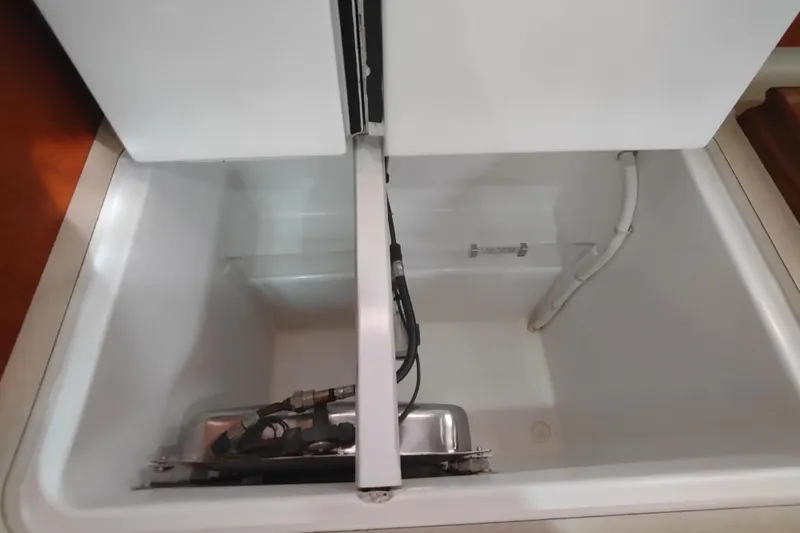 Slide: The Image of Bathroom interior of 1993 Beneteau Moorings 445 yacht, featuring sink and toilet. - 33