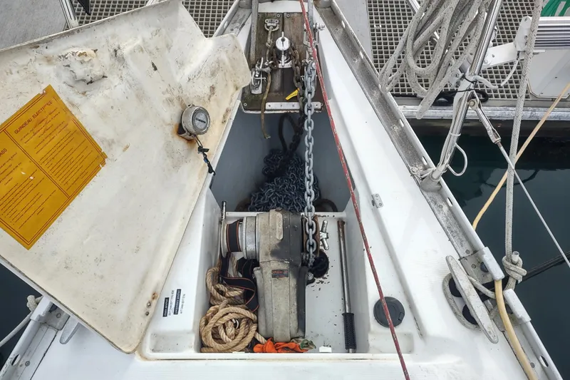 Slide: The Image of Anchor locker of 1993 Beneteau Moorings 445 sailboat with ropes and chains. - 6