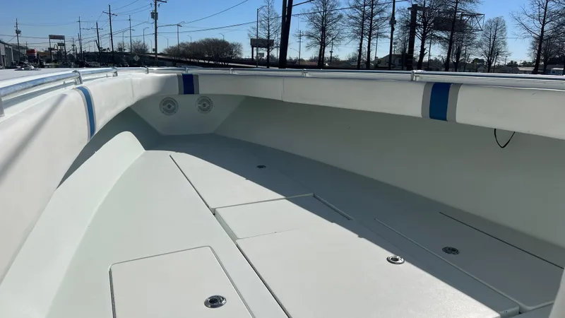 Slide: The Image of 2005 Contender 36 Open boat deck with storage compartments and seating. - 19