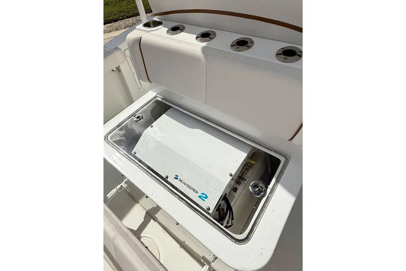 Slide: The Image of 2021 Sea Hunt Gamefish 30 boat with forward seating on calm water. - 16