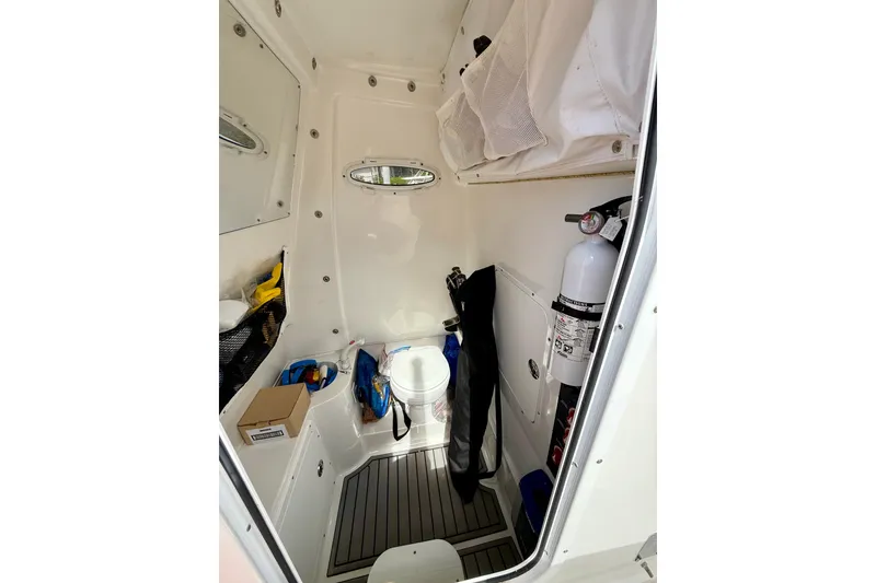Slide: The Image of 2021 Sea Hunt Gamefish 30 boat with forward seating on a sunny day. - 23