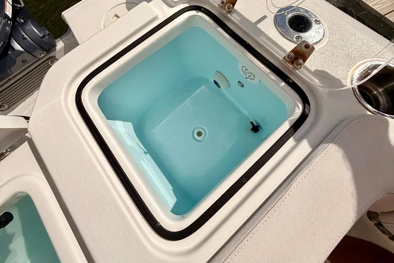 Slide: The Image of 2021 Sea Hunt Gamefish 30 boat with forward seating, featuring a Minn Kota trolling motor. - 26