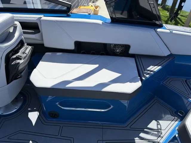 Slide: The Image of Interior of 2026 Cobalt R6 Surf with blue and white seating. - 15