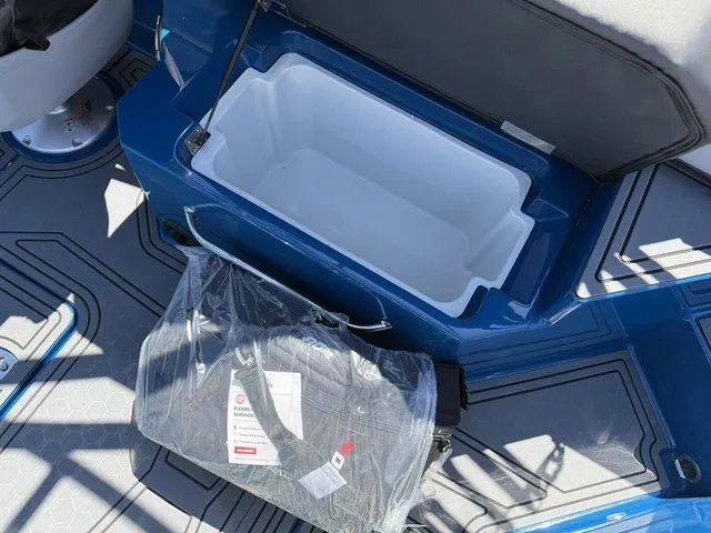 Slide: The Image of Interior of 2026 Cobalt R6 Surf with open storage compartment. - 16