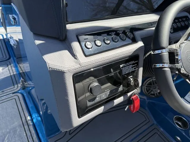 Slide: The Image of Dashboard of 2026 Cobalt R6 Surf with controls and switches. - 22