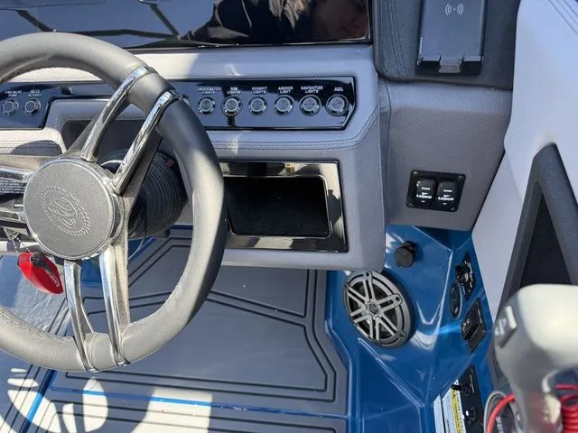 Slide: The Image of Interior view of 2026 Cobalt R6 Surf with steering wheel and controls. - 23