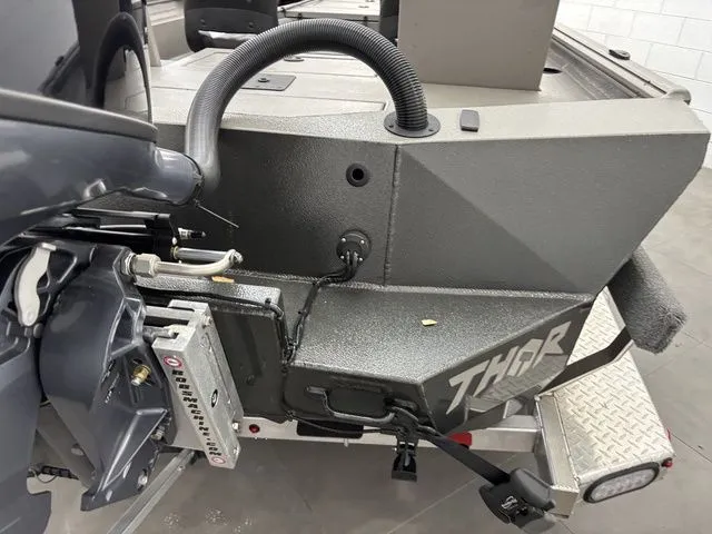 Slide: The Image of Thor Boats 1900 Lake Hammer 2025 with side console and deluxe seating. - 13