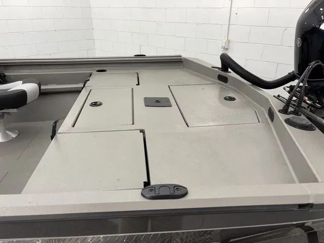 Slide: The Image of Thor Boats 1900 Lake Hammer 2025 storage compartment with side console. - 19