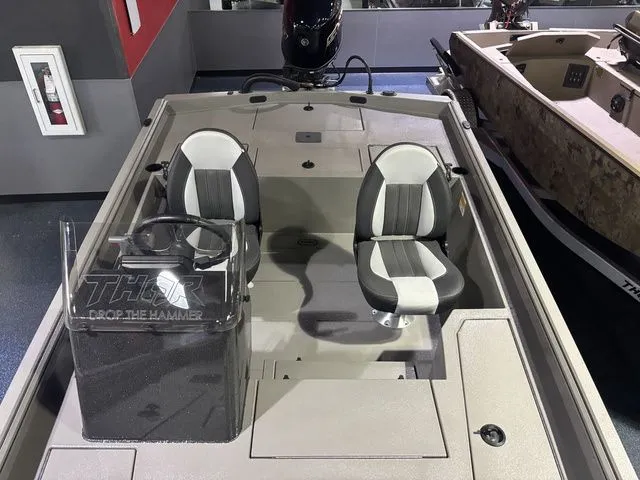 Slide: The Image of 2025 Thor Boats 1900 Lake Hammer Side Console Deluxe with dual seating. - 31