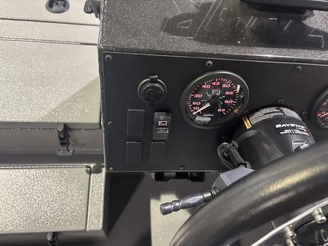 Slide: The Image of Dashboard of Thor Boats 1900 Lake Hammer 2025 with speedometer. - 32