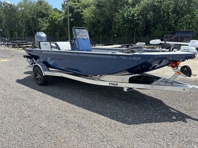 Slide: The Image of 2026 Thor Lake Hammer boat with Yamaha engine in showroom. - 3