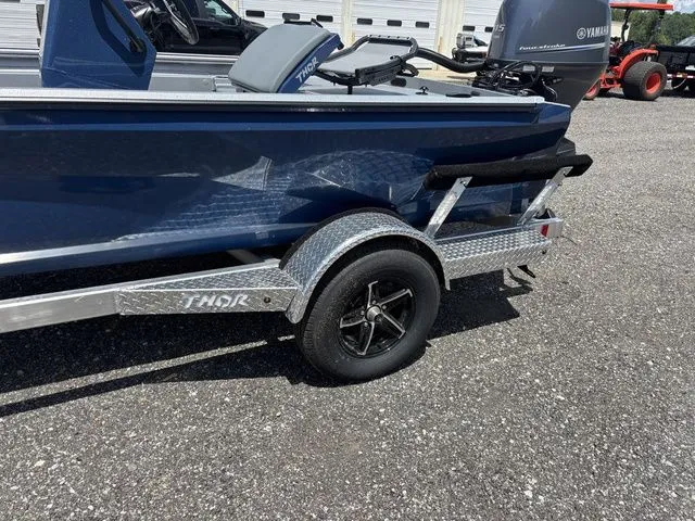 Slide: The Image of 2026 Thor Lake Hammer boat with Baystar steering and storage compartments. - 7