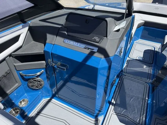 Slide: The Image of Interior of 2026 Cobalt R6 Surf with blue trim. - 27