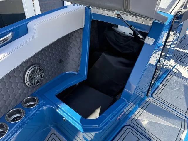 Slide: The Image of Interior of 2026 Cobalt R6 Surf with speaker and storage compartment. - 38