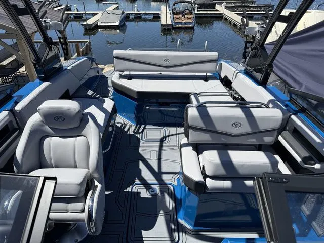 Slide: The Image of Interior of 2026 Cobalt R6 Surf boat at the dock. - 42