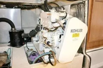 Slide: The Image of Control panel of a 1991 Carver 42 Aft Cabin Motor Yacht with hour meter and circuit breakers. - 21