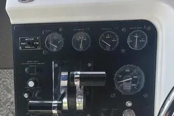 Slide: The Image of 1991 Carver 42 Aft Cabin Motor Yacht kitchen with modern appliances and compact design. - 10