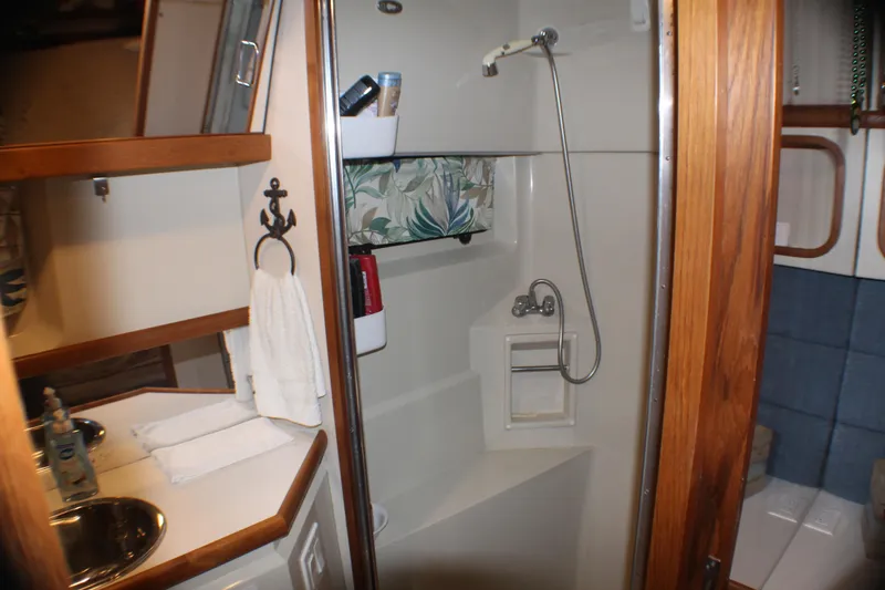Slide: The Image of Bathroom interior of 1991 Carver 42 Aft Cabin Motor Yacht with shower and sink. - 45
