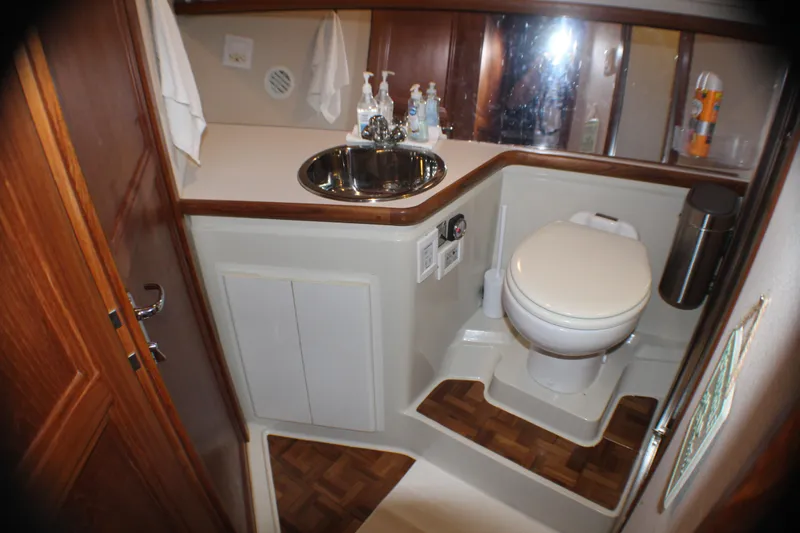 Slide: The Image of Bathroom interior of 1991 Carver 42 Aft Cabin Motor Yacht with sink and toilet. - 50