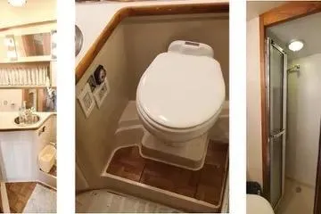 Slide: The Image of Bathroom interior of 1991 Carver 42 Aft Cabin Motor Yacht, featuring sink, toilet, and shower. - 51