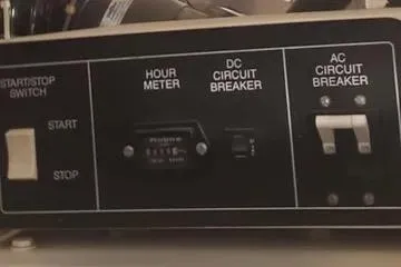 Slide: The Image of Control panel of a 1991 Carver 42 Aft Cabin Motor Yacht with hour meter and circuit breakers. - 67