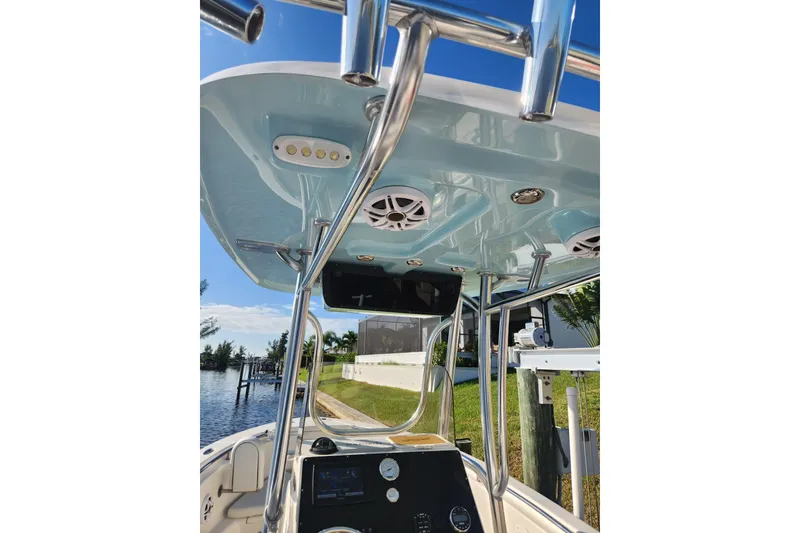 Slide: The Image of 2023 Bulls Bay 230 Center Console boat with sleek T-top and modern features. - 10