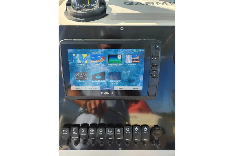 Slide: The Image of Garmin navigation system on 2023 Bulls Bay 230 Center Console boat dashboard. - 7