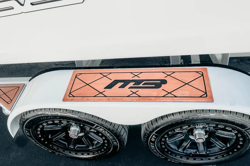 Slide: The Image of Trailer with MB logo and dual wheels, 2026 MB B52 23 Alpha model. - 20