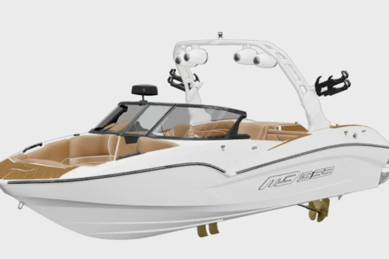 Slide: The Image of 2026 MB B52 23 Alpha boat, sleek white design with tan interior and wakeboard tower. - 24