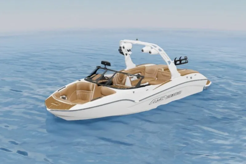 Slide: The Image of 2026 MB B52 23 Alpha boat on calm blue water, featuring sleek design and tan interior. - 25