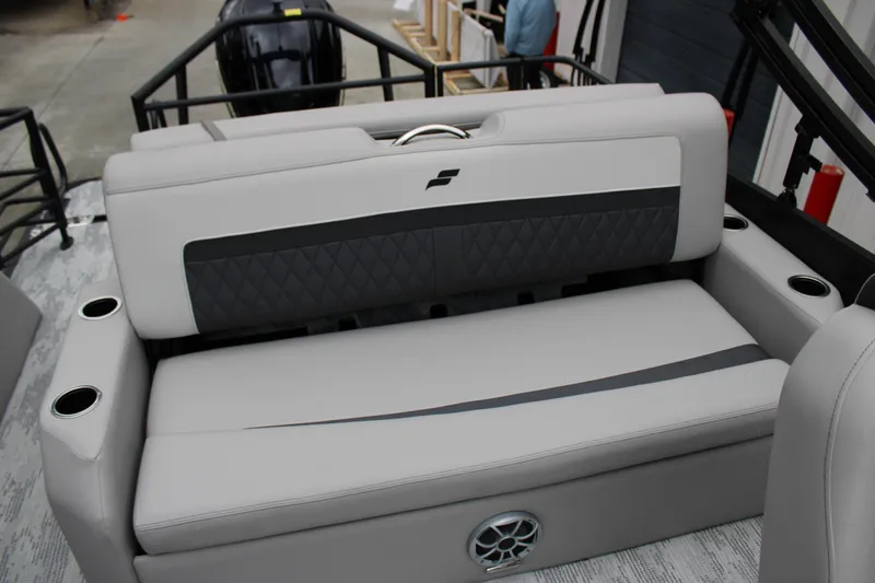 Slide: The Image of 2026 Starcraft SLS 3 Q DH boat interior with gray seating and cup holders. - 17