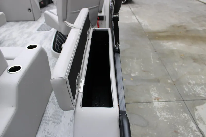 Slide: The Image of Open storage compartment in 2026 Starcraft SLS 3 Q DH boat interior. - 18