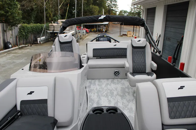 Slide: The Image of 2026 Starcraft SLS 3 Q DH boat interior with modern seating and sleek design. - 4
