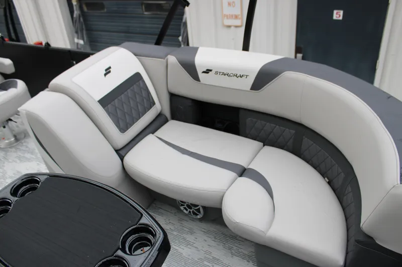 Slide: The Image of Luxurious seating on 2026 Starcraft SLS 3 Q DH boat, featuring elegant design and comfort. - 5