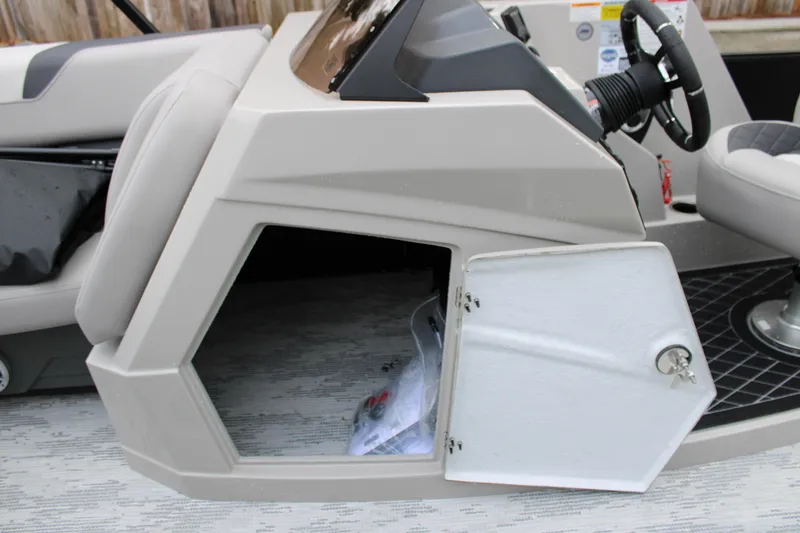 Slide: The Image of Open storage compartment on 2026 Starcraft SLS 3 Q DH boat, showing interior space. - 9