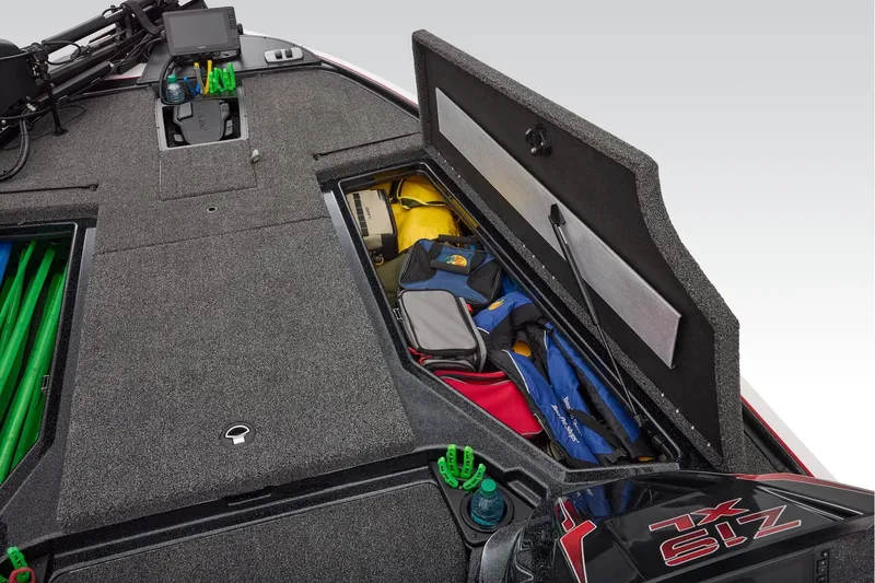 Slide: The Image of Storage compartment in 2026 Nitro Z19 XL boat with accessories and manuals. - 22