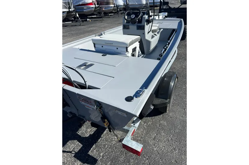 Slide: The Image of 2026 Tracker Bass Tracker Classic CC boat on trailer, parked outdoors. - 50