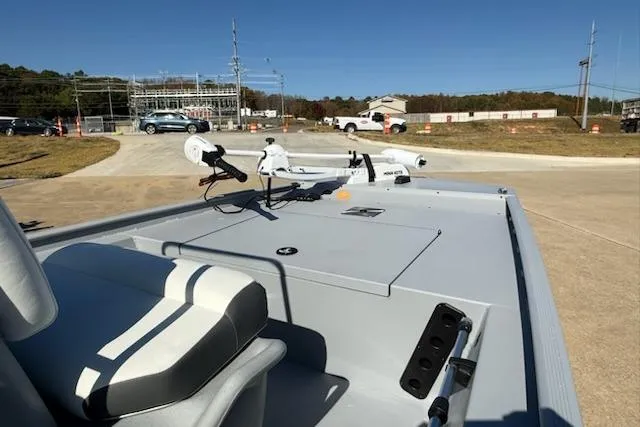 Slide: The Image of 2026 Tracker Bass Tracker Classic CC boat with seating and equipment on a sunny day. - 3