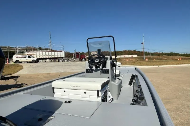 Slide: The Image of 2026 Tracker Bass Tracker Classic CC boat on a sunny day, parked on concrete. - 4