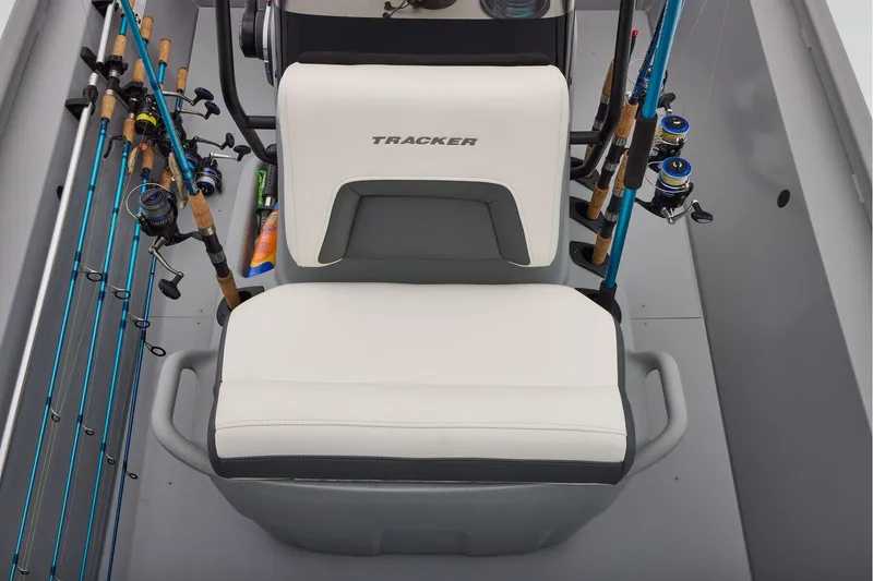 Slide: The Image of 2026 Tracker Bass Tracker Classic CC boat interior with fishing rods and cushioned seat. - 23