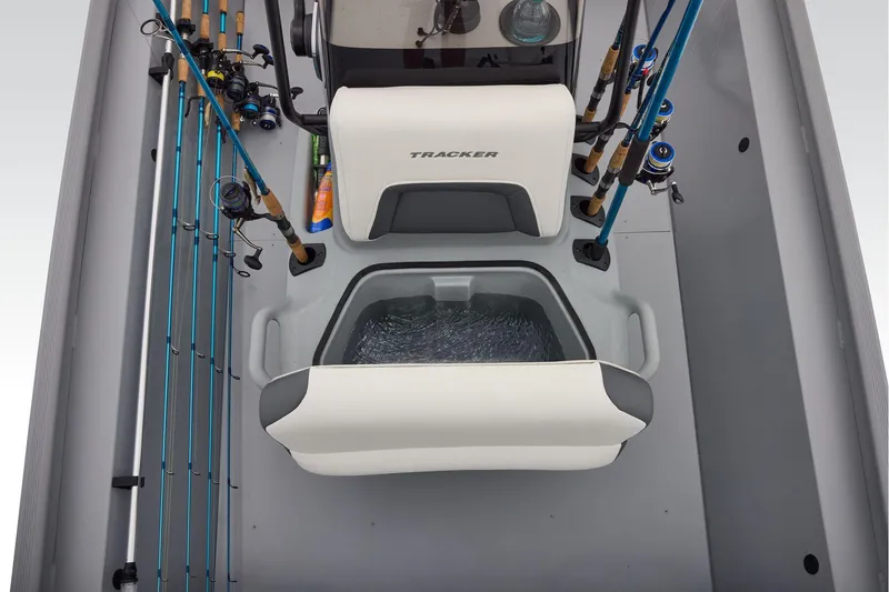 Slide: The Image of 2026 Tracker Bass Tracker Classic CC interior with fishing rods and livewell. - 24