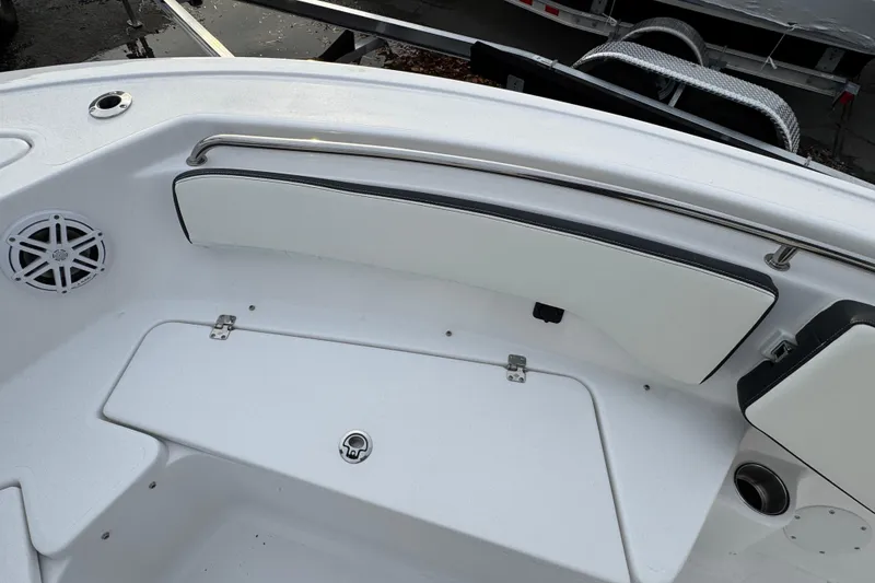 Slide: The Image of 2026 Tidewater 198 CC Adventure boat interior with seating and speaker. - 17