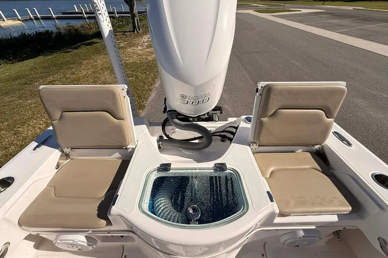 Slide: The Image of 2019 Everglades 243 Center Console boat with Yamaha 300 engine and seating area. - 4