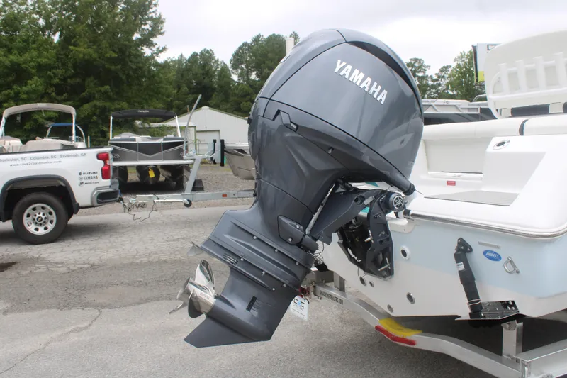 Slide: The Image of Tidewater 210 LXF 2026 boat with Yamaha outboard motor on trailer. - 20